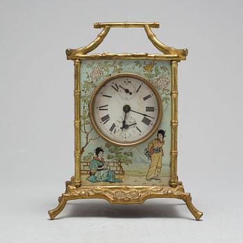 A mantel clock, circa 1900.