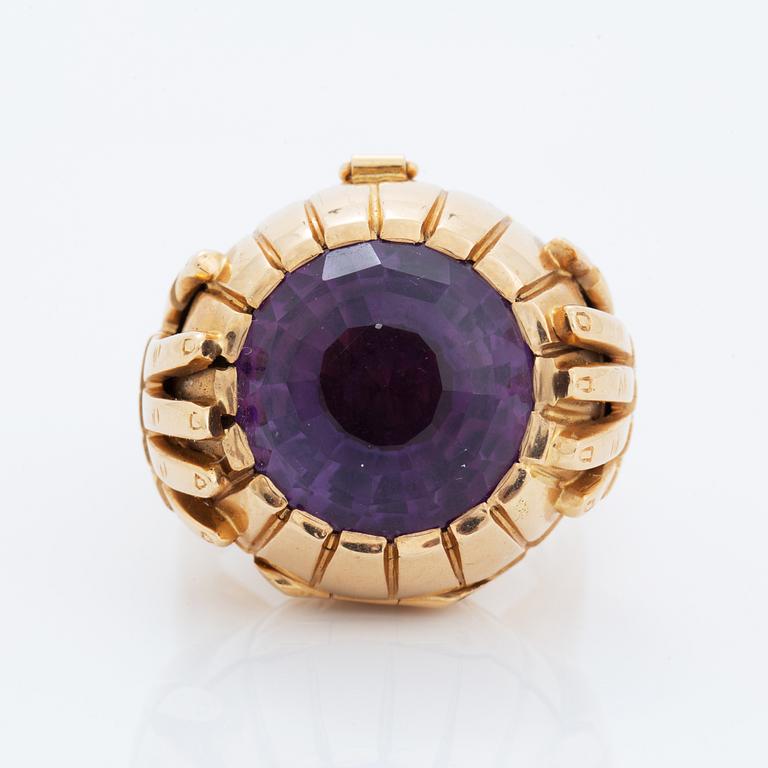 Amethyst ring with locket.
