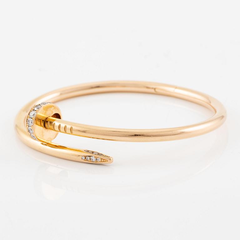 A Cartier bracelet "Juste un clou" in 18K rose gold with round brilliant-cut diamonds.