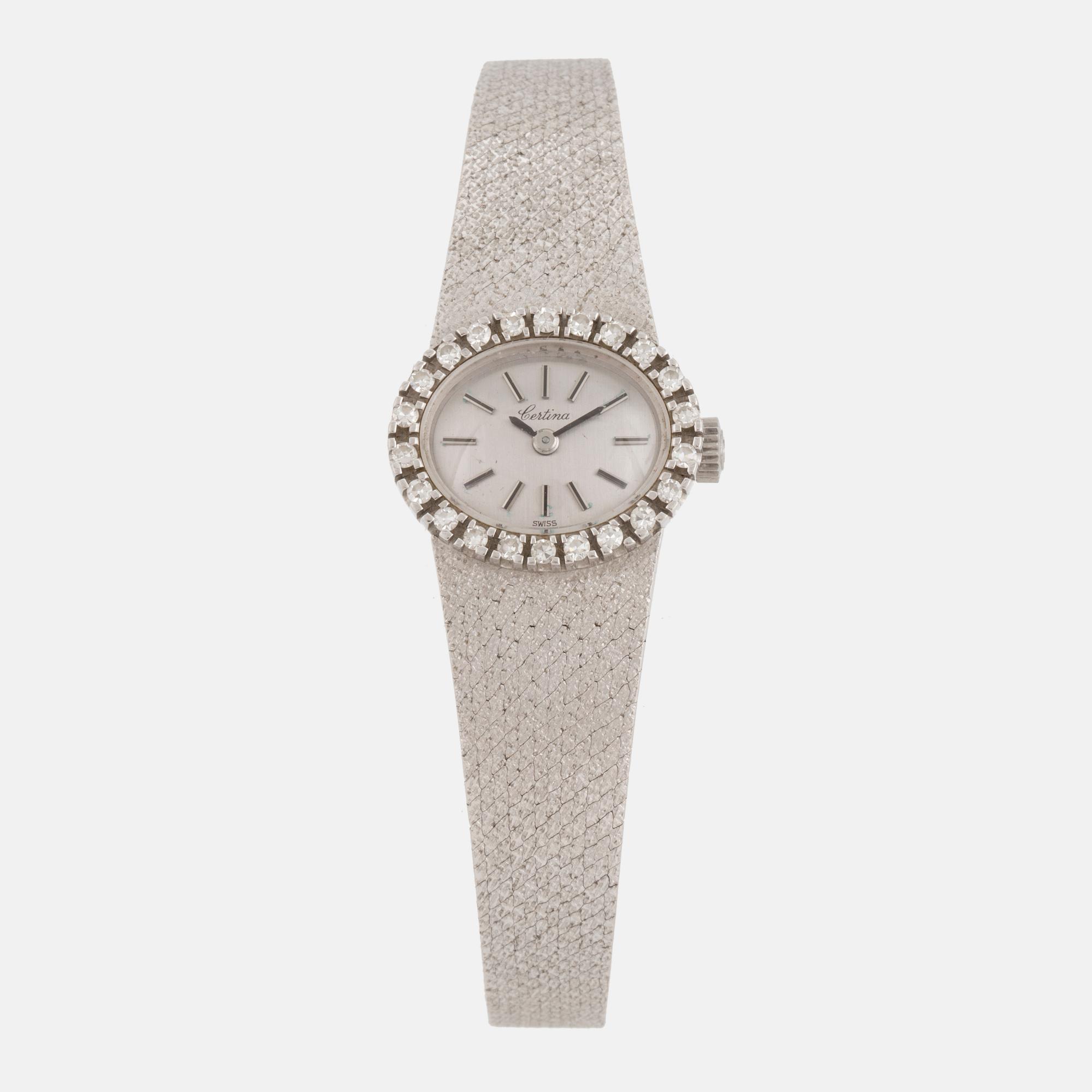 A Certina ladies watch, 18K gold and diamonds.