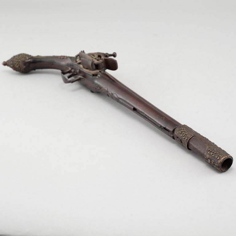 A mid 19th century miquelet lock pistol.