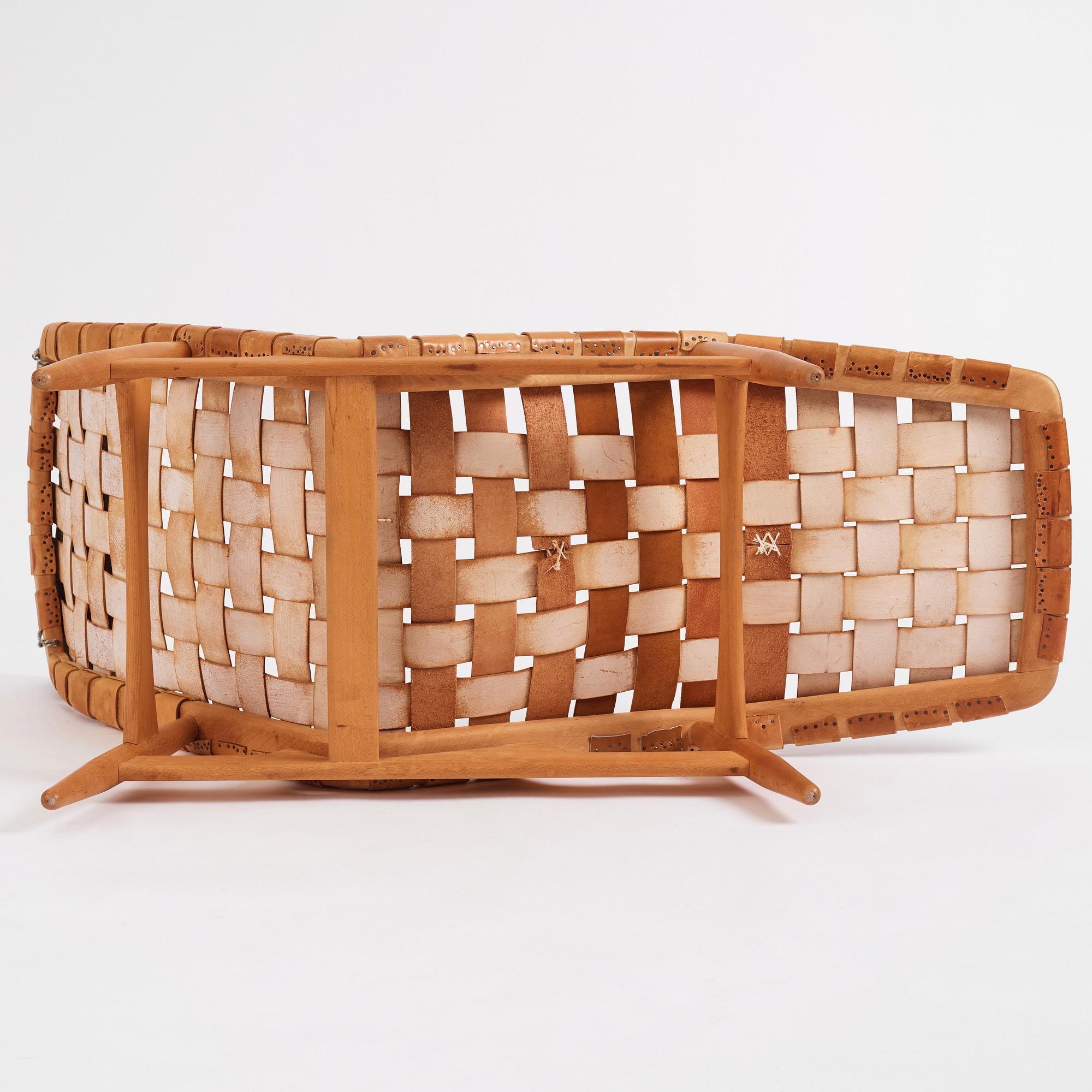 Arne Vodder, a natural brown leather lounge chair, Bovirke, Denmark 1950s.