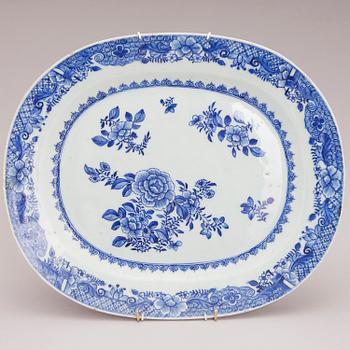 Four Chinese porcelain dishes and a Japanese porcelain bowl, 18th Century.