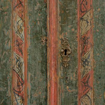 A Swedish polychrome-painted rococo cabinet, late 18th century.