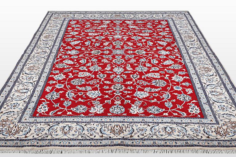 A carpet, Nain, part silk, 9 LAA, ca 384 x 296 cm.