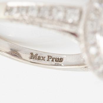 Max Prus ring 18K vitguld med en fasettslipad rosa safir och runda briljantslipade diamanter.
