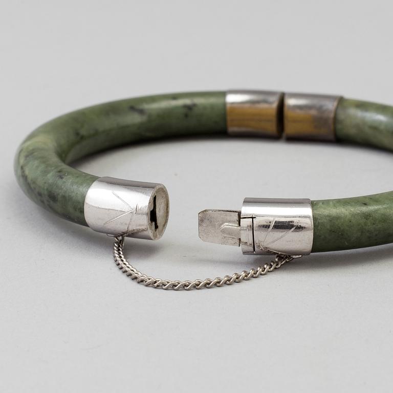 A Chinese armband and a pendant, 20th Century.