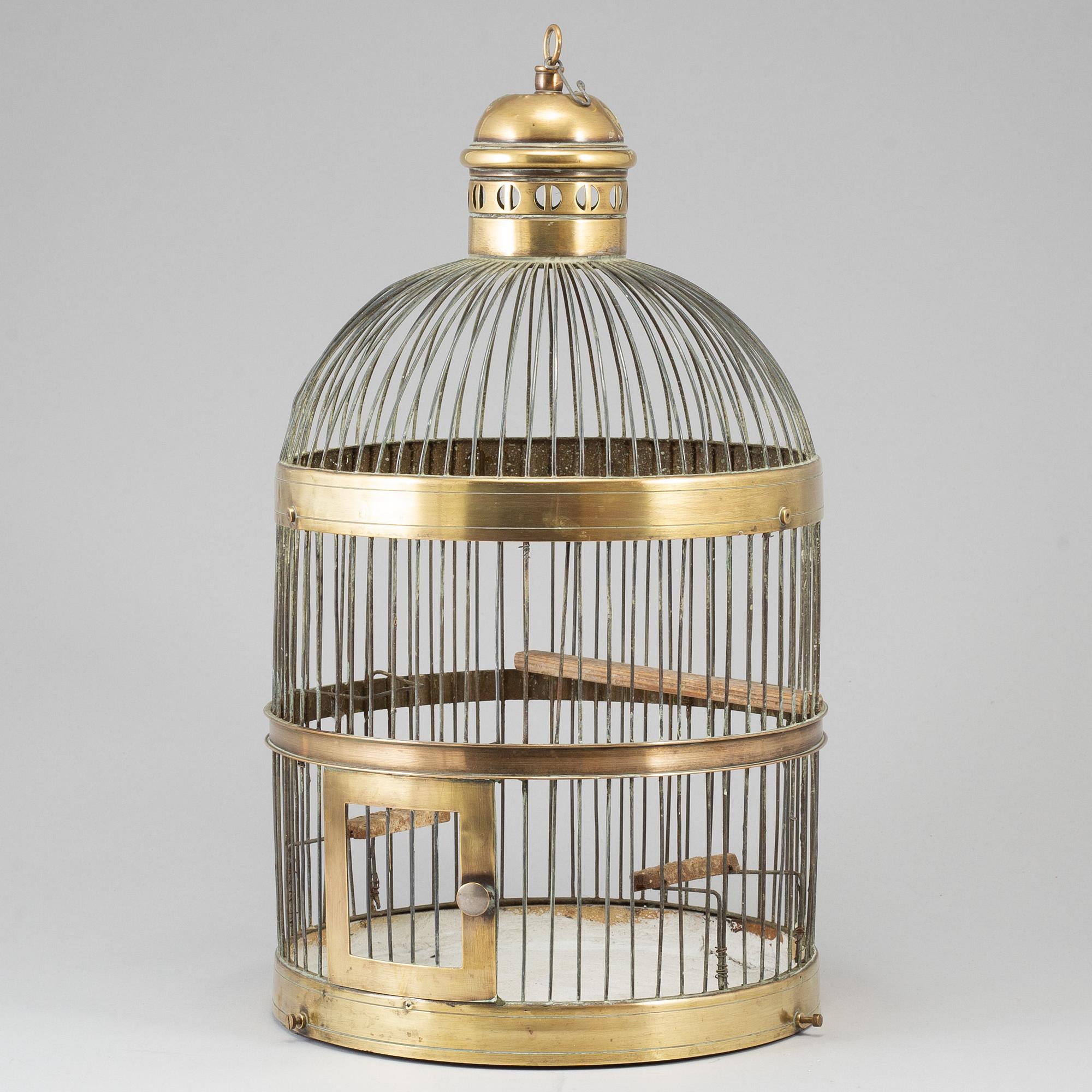 A 19th century brass bird cage.