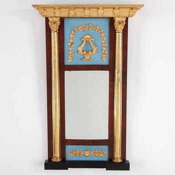 An Empire mirror, first half of the 19th Century.