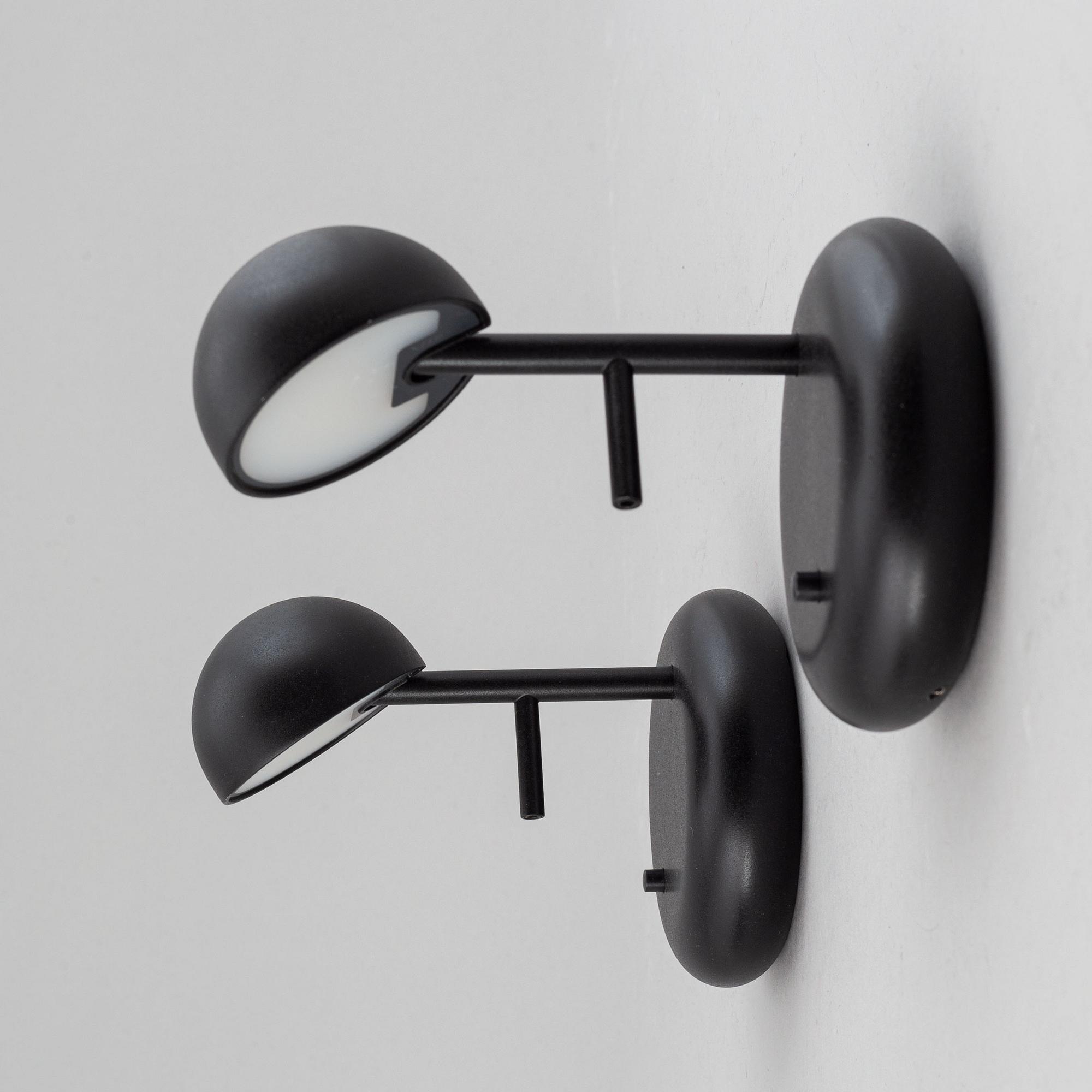 Ichiro Iwasaki, a pair of 'Pin' bedside lights for Vibia.
