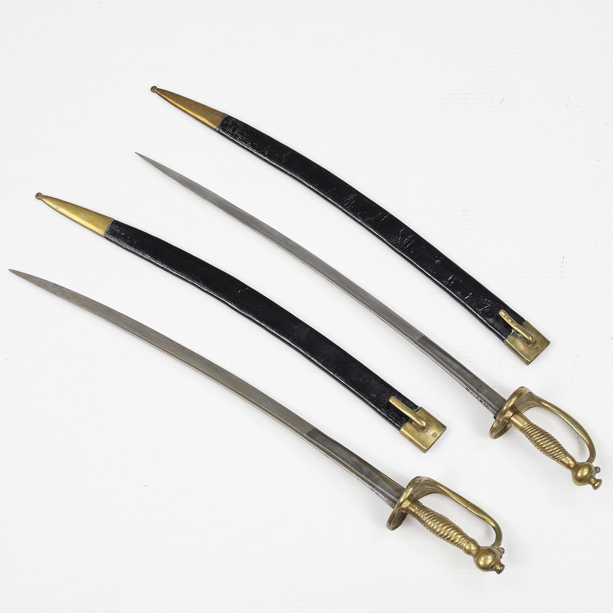 Two Swedish cutlasses 1748-1856 pattern with scabbards.