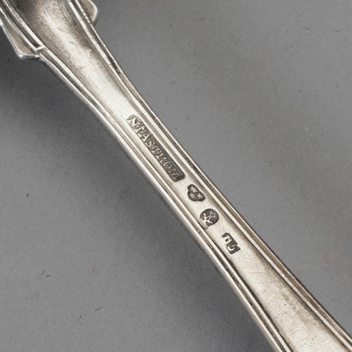 NINE 19TH CENTURY SILVER TABLE SPOONS.