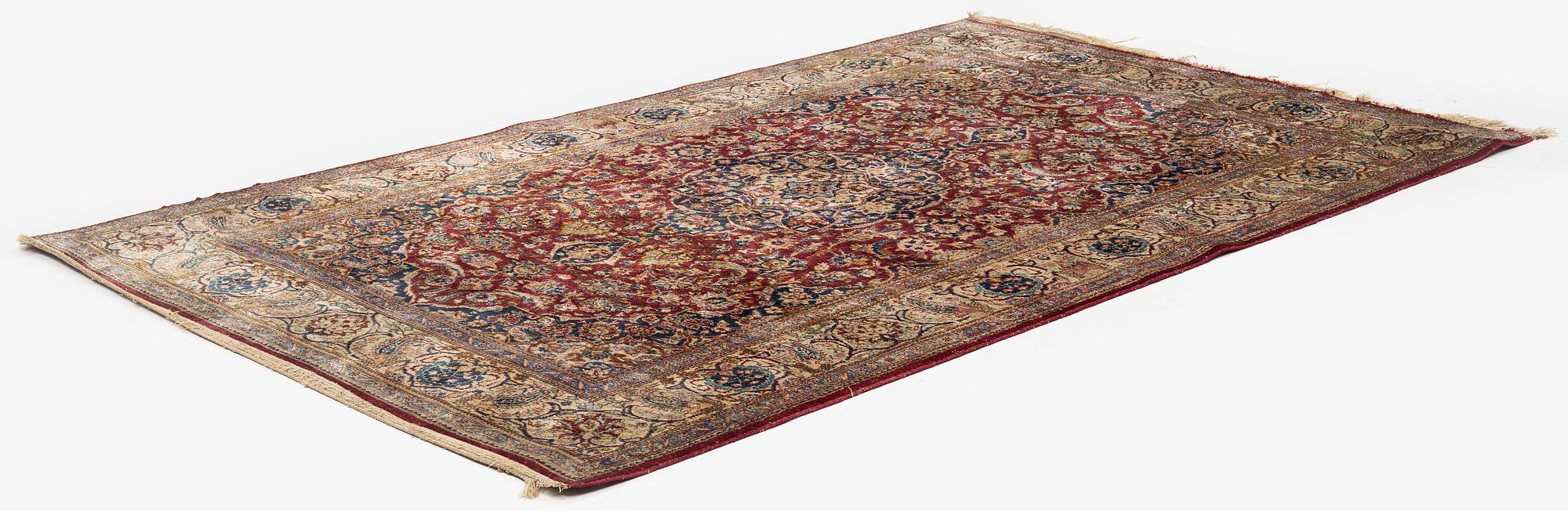 A semi-antique silk Kashan, central Persia, c. 210 x 140 cm.