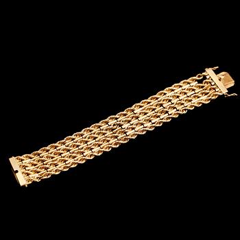 ARMBAND, 18 k guld, tvinnad länk med stavar, 1900-talets mitt. Vikt ca 45 g.