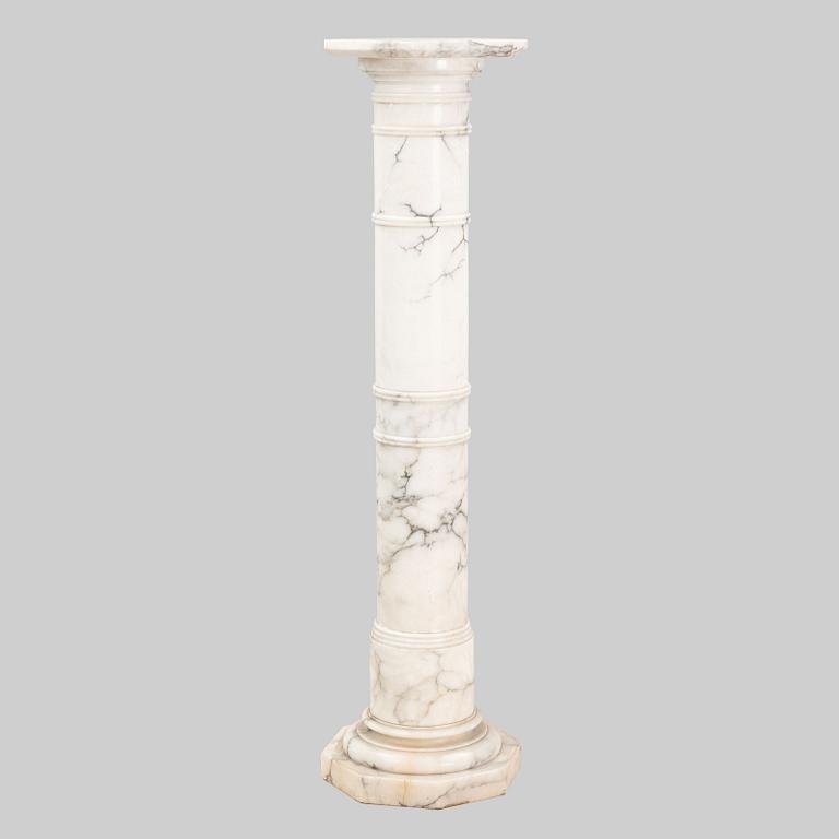 A marble pedestal, early 20th Century.