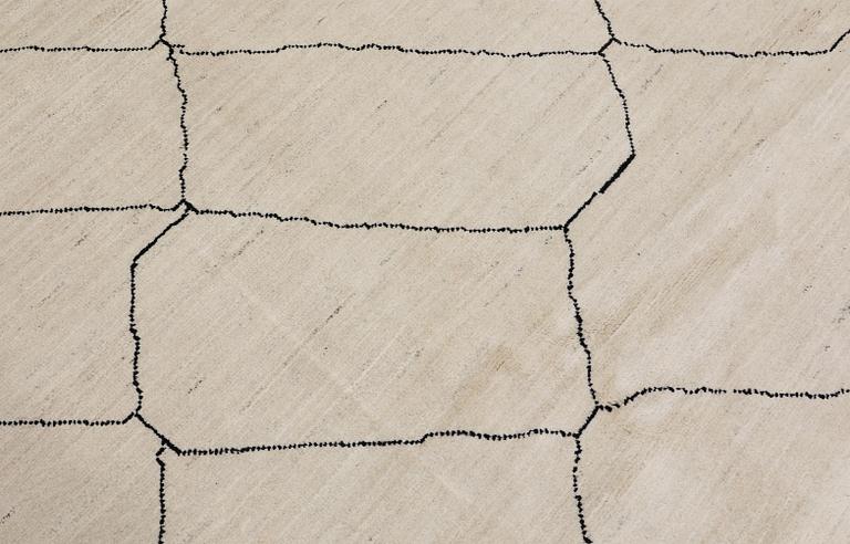 A Moroccan carpet, 305 x 251 cm.