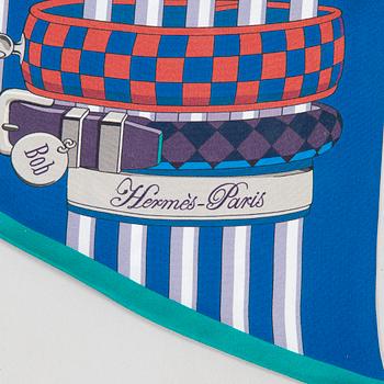 Hermès, a 'Collier de Chiens Maxi Twilly' silk scarf.