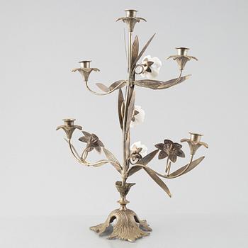 Three nickle-plated  candelabras, France, first half of the 20th century.