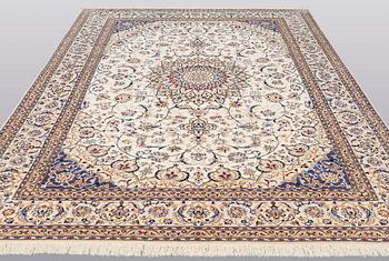 A carpet, Nain part silk, 361 x 262 cm.
