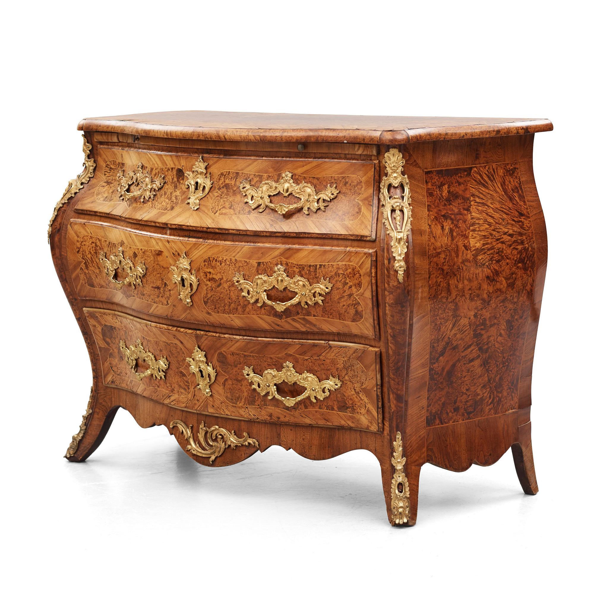 A burr-alder and gilt brass-mounted rococo commode by J. Sjölin (master 1767-1785).