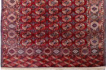 An antique Tekke turkmen carpet ca 328x232 cm.