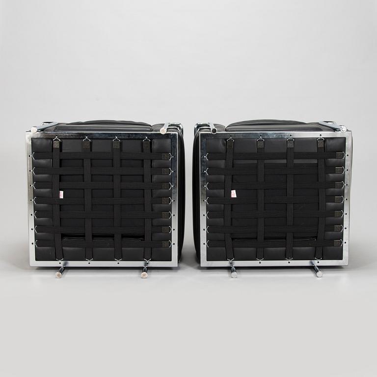 Pierre Jeanneret, Charlotte Perriand & Le Corbusier, a pair of 'LC2' armchairs, Cassina, Italy.