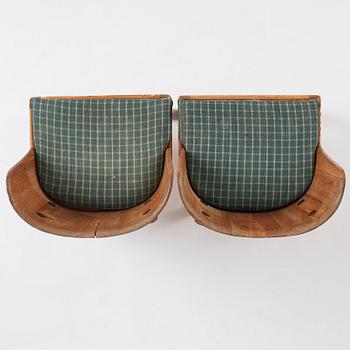 Axel Einar Hjorth, a pair of "Lovö" stained pine chairs, Nordiska Kompaniet, 1930s.