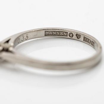 Solitaire ring in 18K white gold with one diamond.