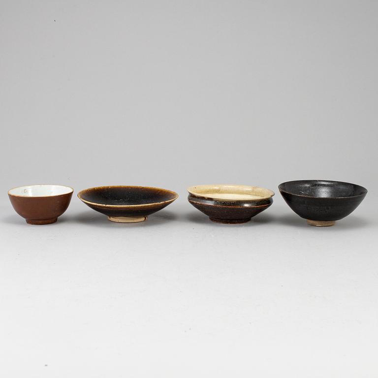 A group of four Southeast asian ceramic bowls and deep dishes, presumably 16/17th century.