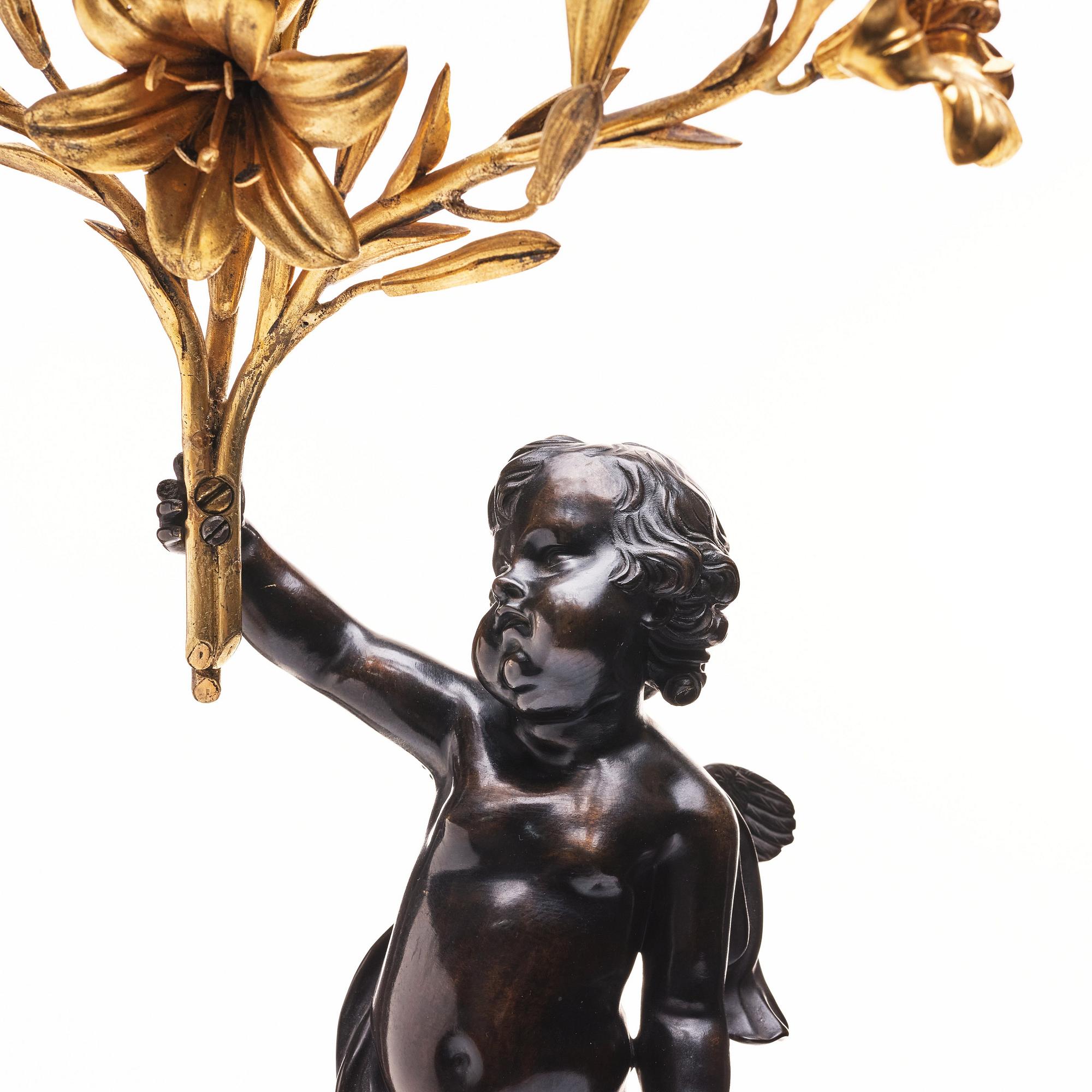 A pair of Louis XV/ Louis XVI five-light candelabra, second part of the 18th century.
