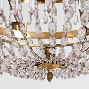 A late Gustavian gilt-brass and cut-glass five-light chandelier, Stockholm, late 18th century.