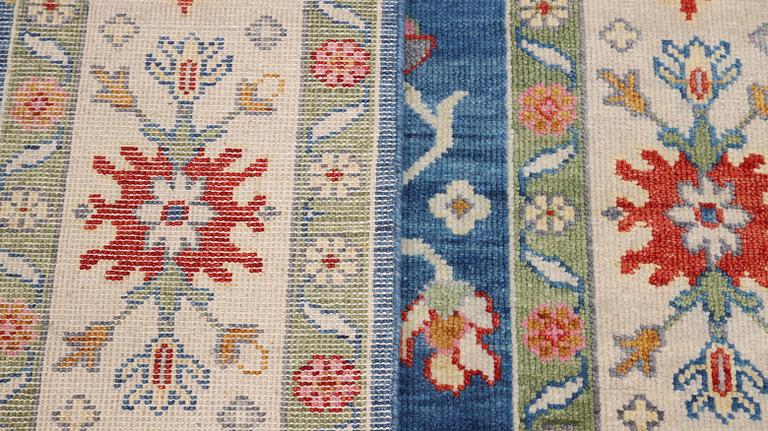 A carpet, Ushak Design, ca 303 x 246 cm.