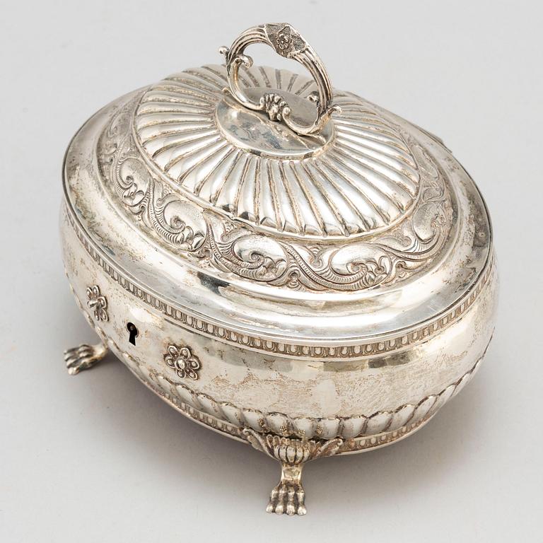 A silver sugarbox by Eric Söderholm Härnösand 1844.