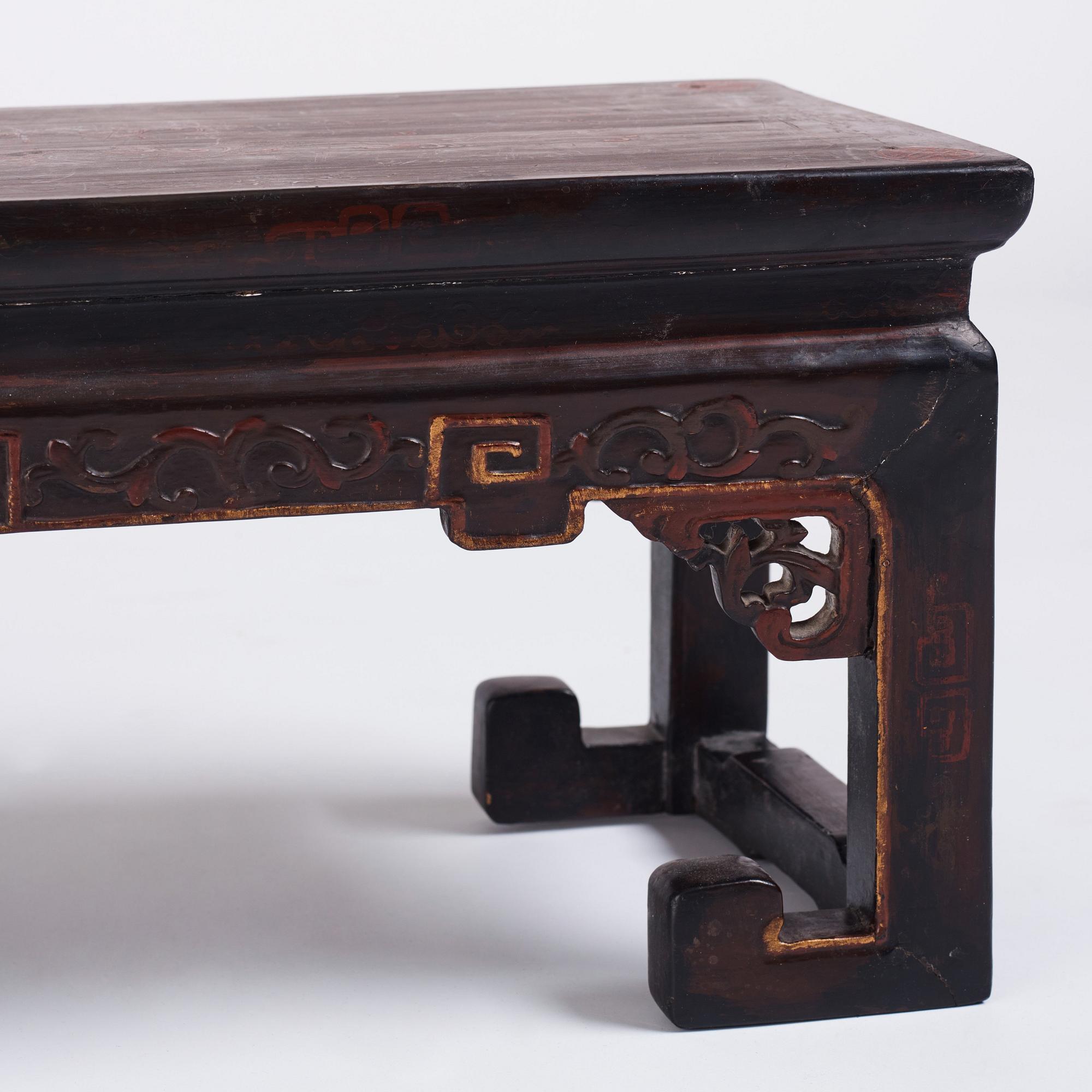 A Chinese lacquered Kang table, Qing dynasty.