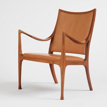 Hans Asplund, a walnut and leather easy chair, Nordiska Kompaniet, ca 1955, for the Nordiska Kompaniet beauty salon.