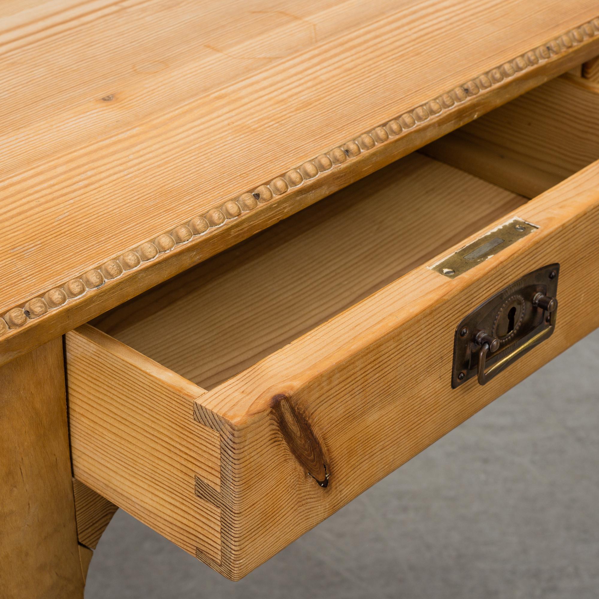 A 20th century rococo style writing desk.