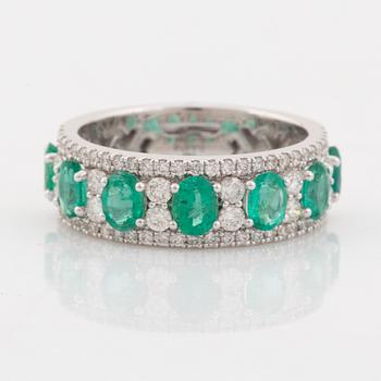 Emerald and brilliant cut diamond ring.