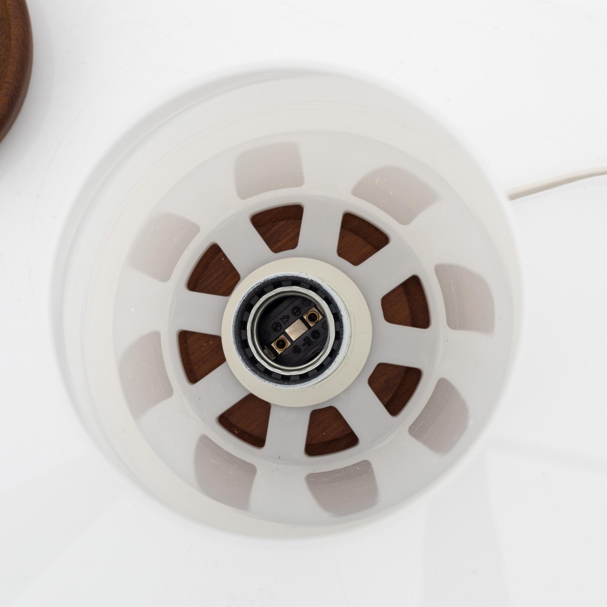 Uno & Östen Kristiansson, a pair of teak and acrylic table lights, Luxus, Vittsjö.