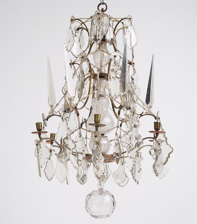 A Swedish rococo gilt-brass and cut glass six-branch chandelier by O. Westerberg (master in Stockholm 1769-1811).