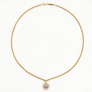 Chopard, an 18K gold 'Happy Diamonds' necklace with brilliant-cut diamonds.