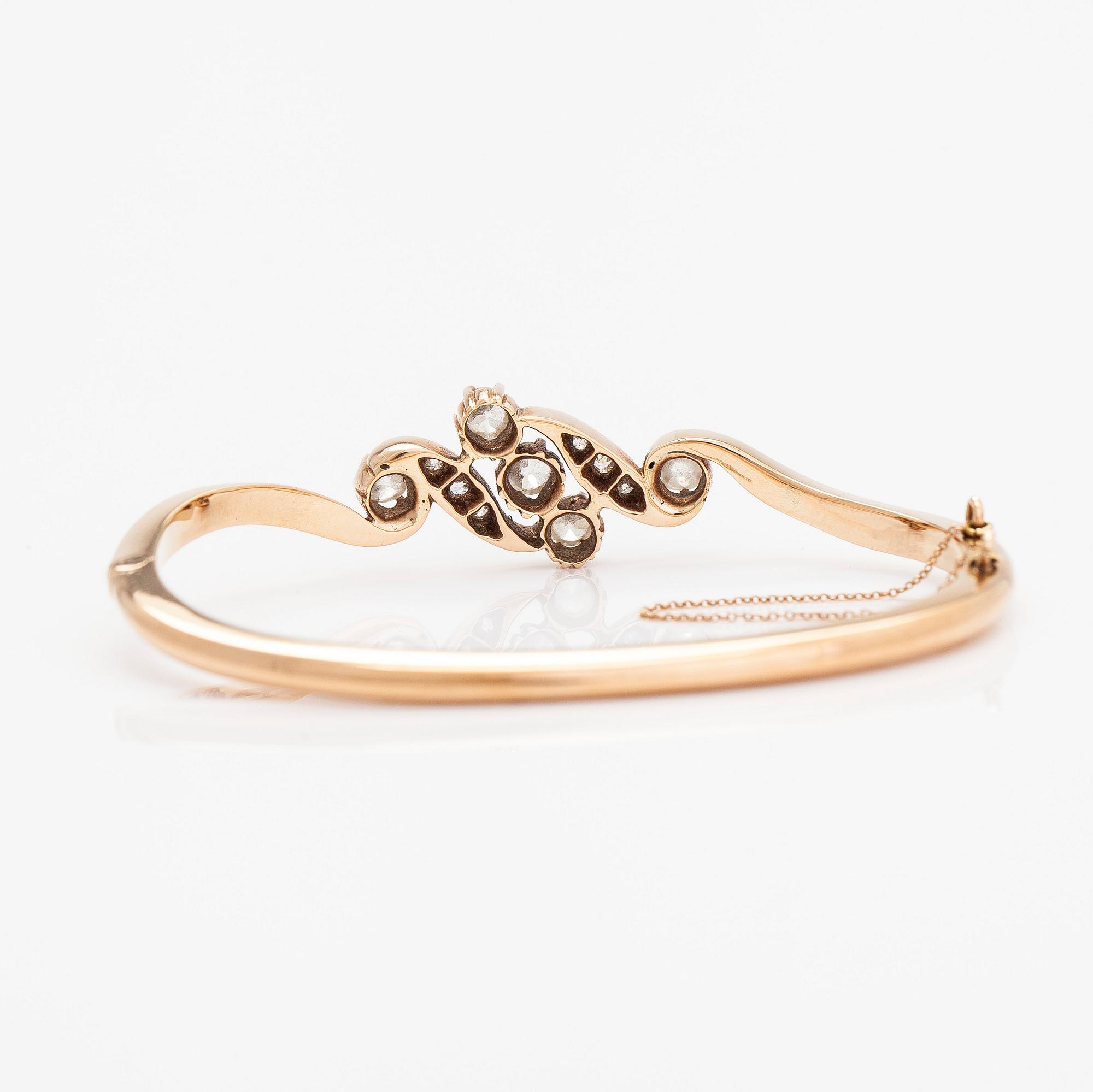 A 14K gold bangle, set with old-cut diamonds, St. Petersburg 1882-1898.