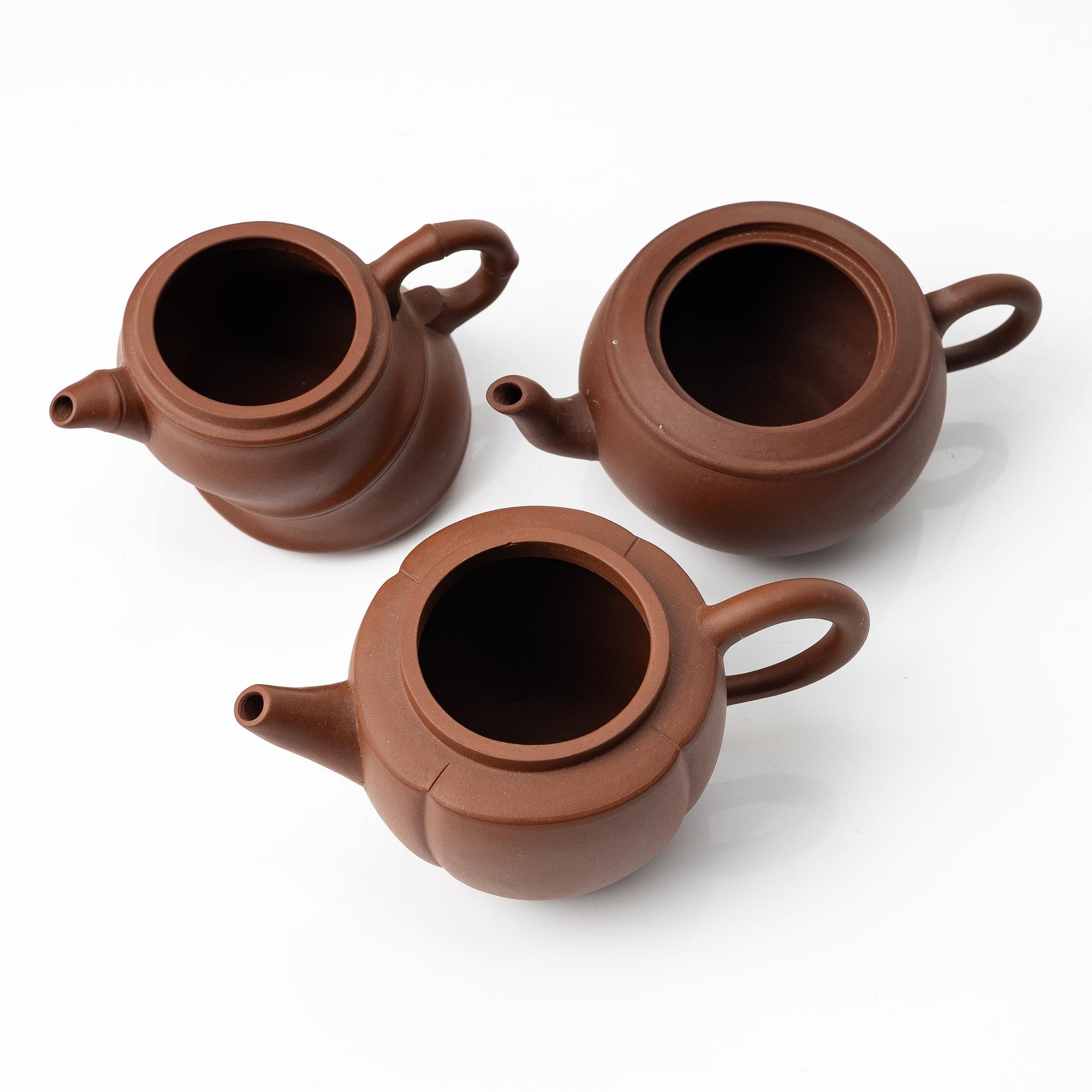 A group of three yixing 'gongfu' teapots, China, 1980s.