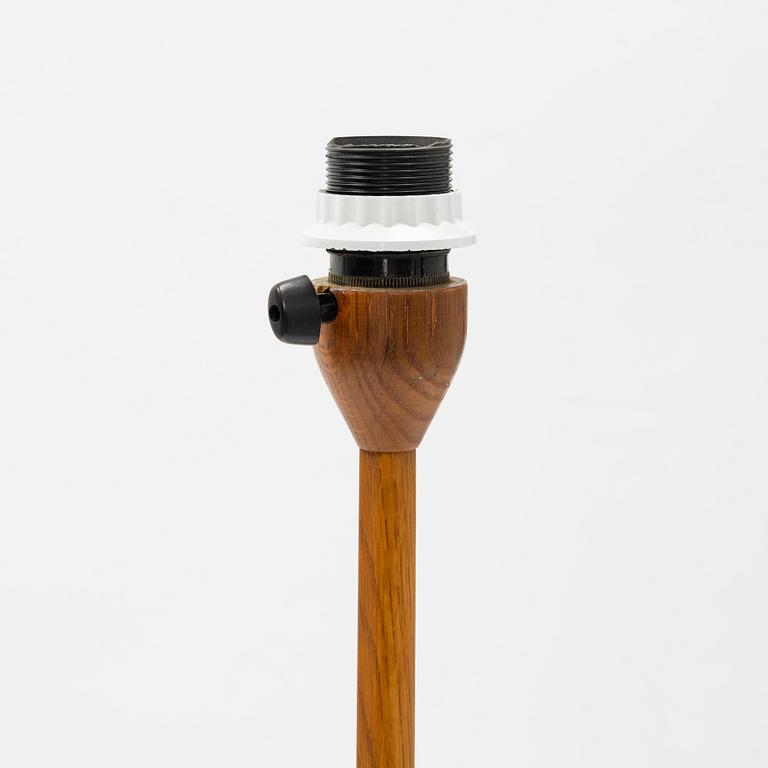 An oak floor lamp from Luxus, second half of the 20th Century.