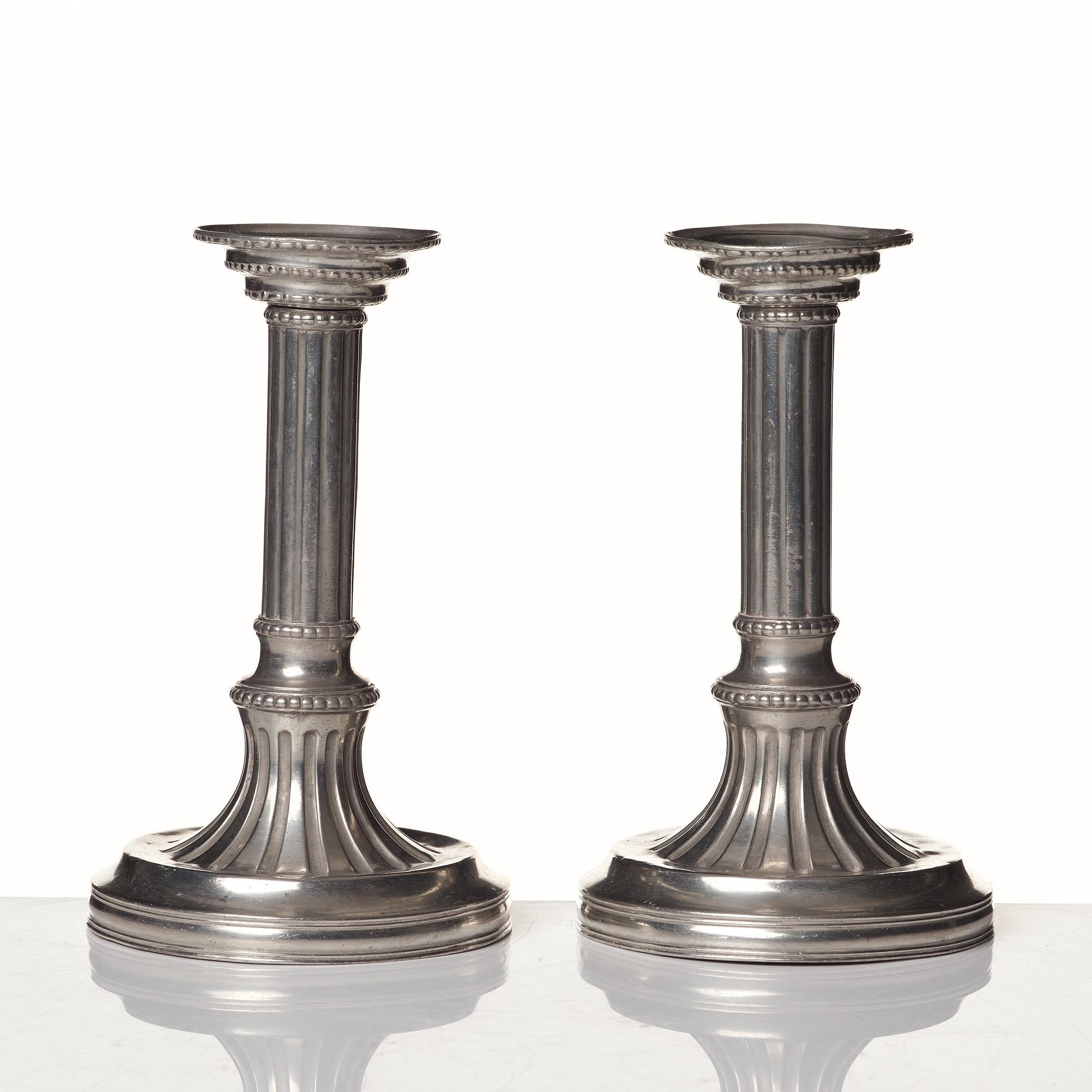 A pair of Gustavian pewter candlesticks by R Ryman 1784.