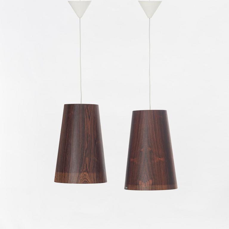 Uno & Östen Kristiansson, a pair of rosewood veneered model 506 ceiling lights, Luxus, Vittsjö, 1960's.