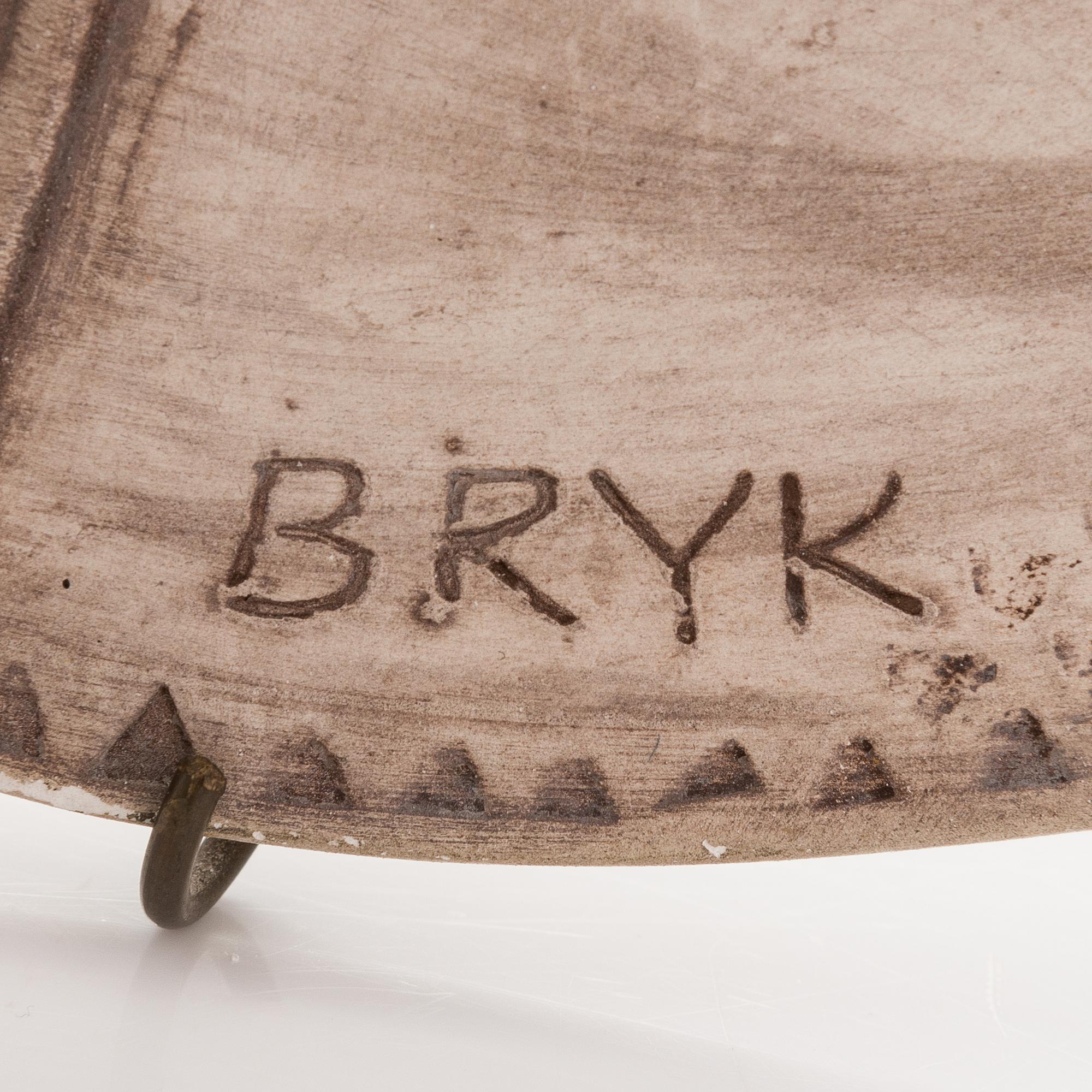 Rut Bryk, a stoneware relief signed BRYK.