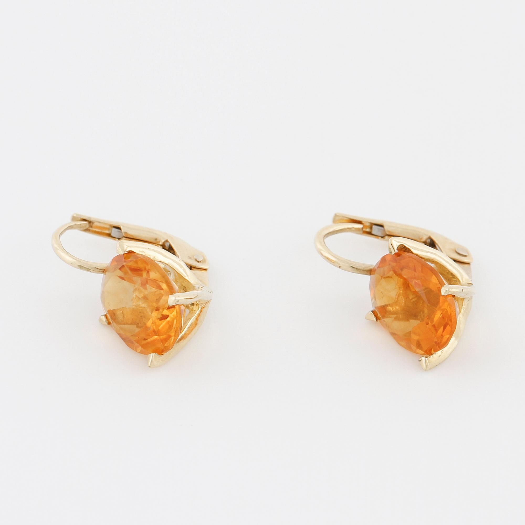 A pair of citrine earrings.