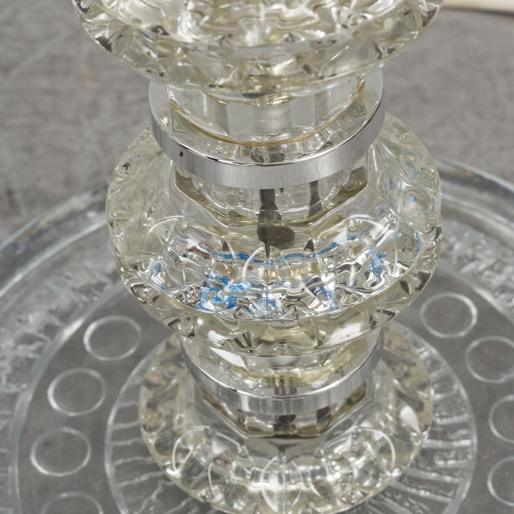 A glass floor lamp.