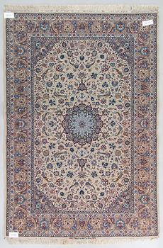 A semi-antique Isfahan rug, central Persia, signed c. 238 x 165 cm.