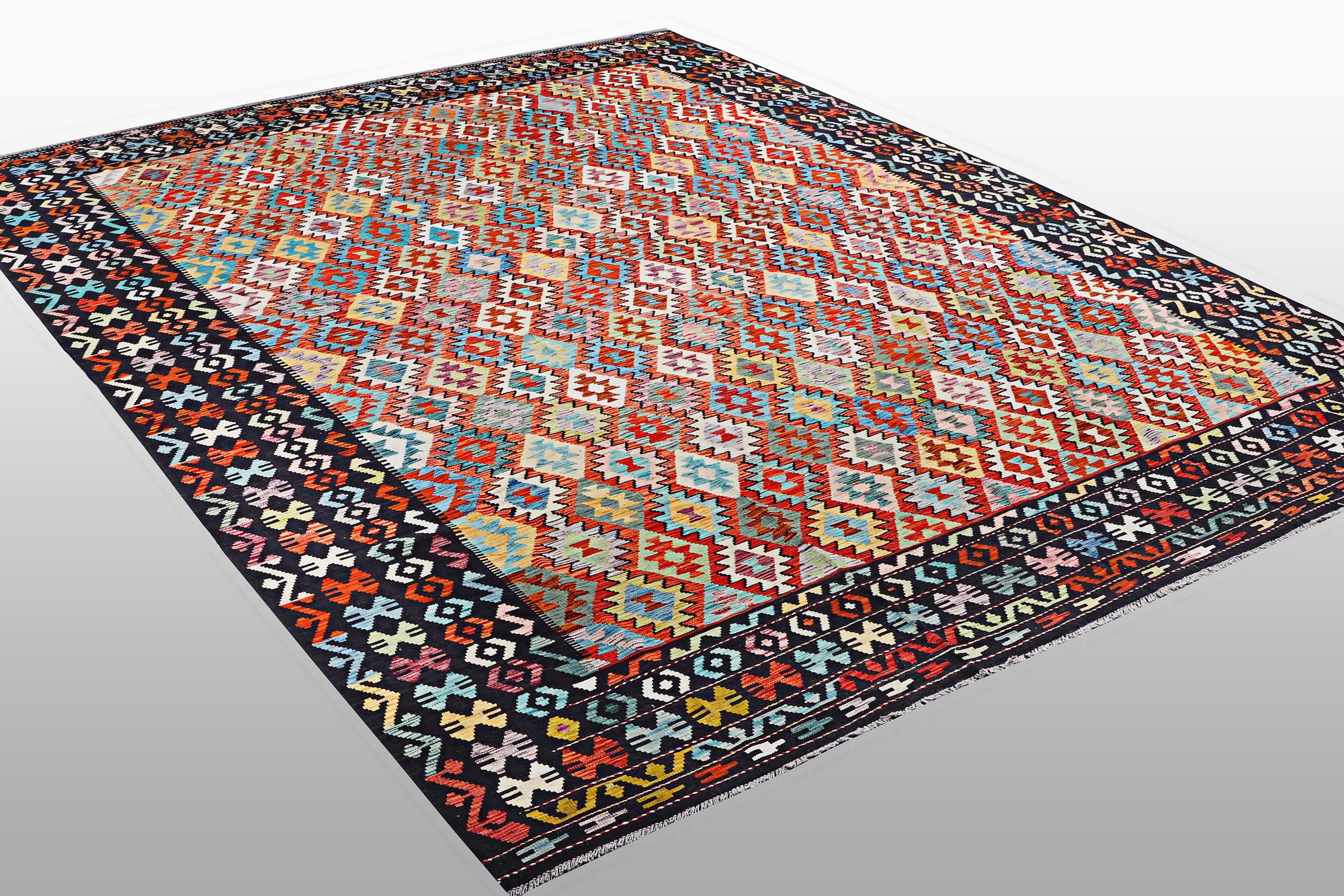 A Kelim carpet, c. 398 x 311 cm.
